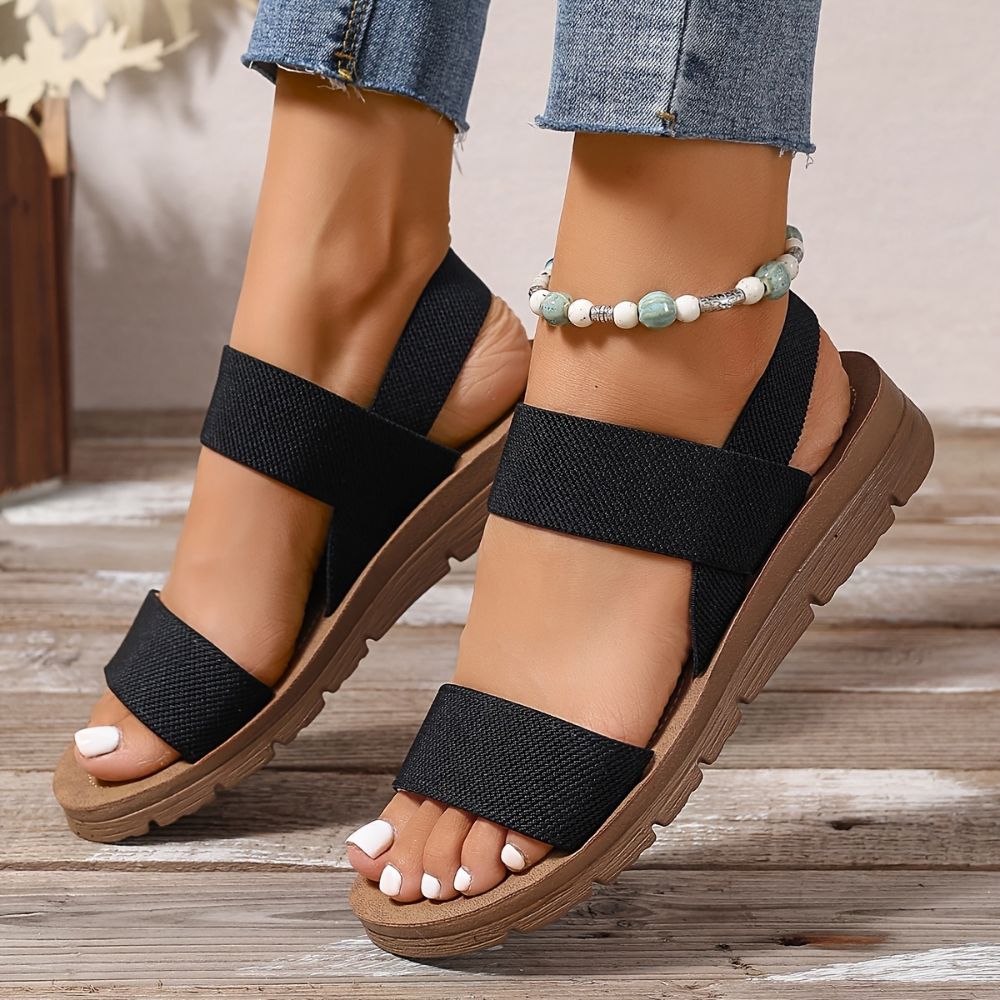 Women's cross-strap sandals with thick sole