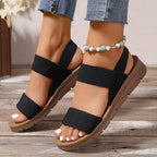 Women's cross-strap sandals with thick sole