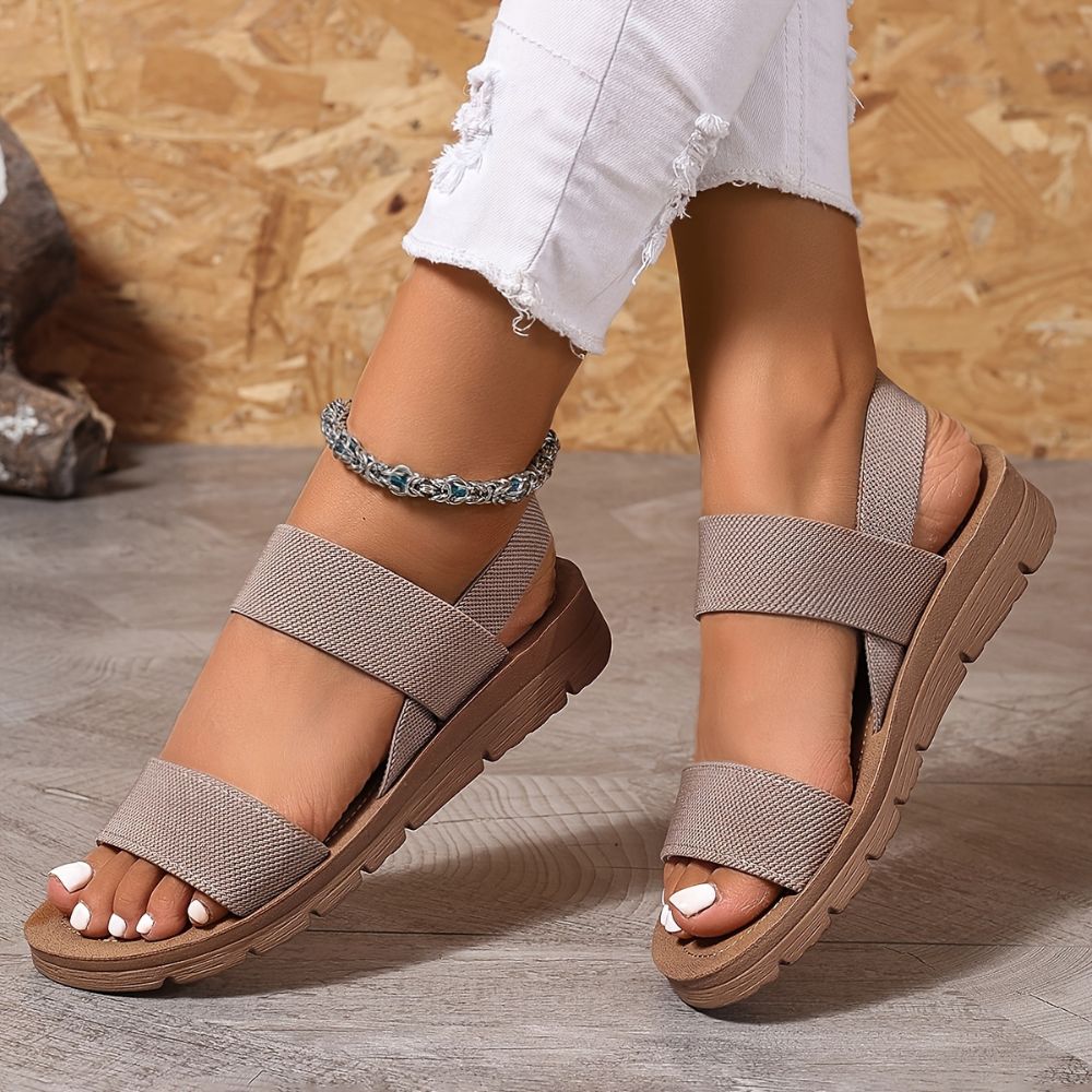 Women's cross-strap sandals with thick sole